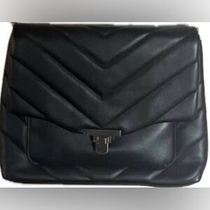 A New Day Black Quilted Shoulder Bag with zipper closure. New without tags.